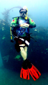 Scuba diver demonstrating neutral buoyancy and control underwater during training